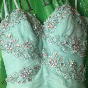 Minty mermaid style bedazzled prom dress